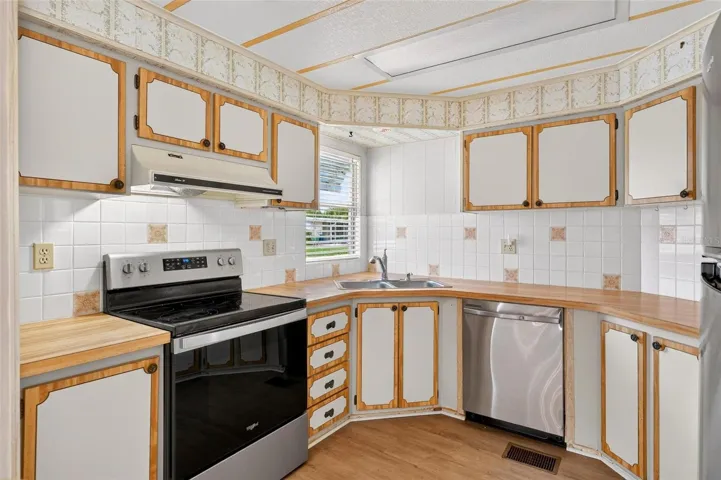 Kitchen with stainless steel appliances