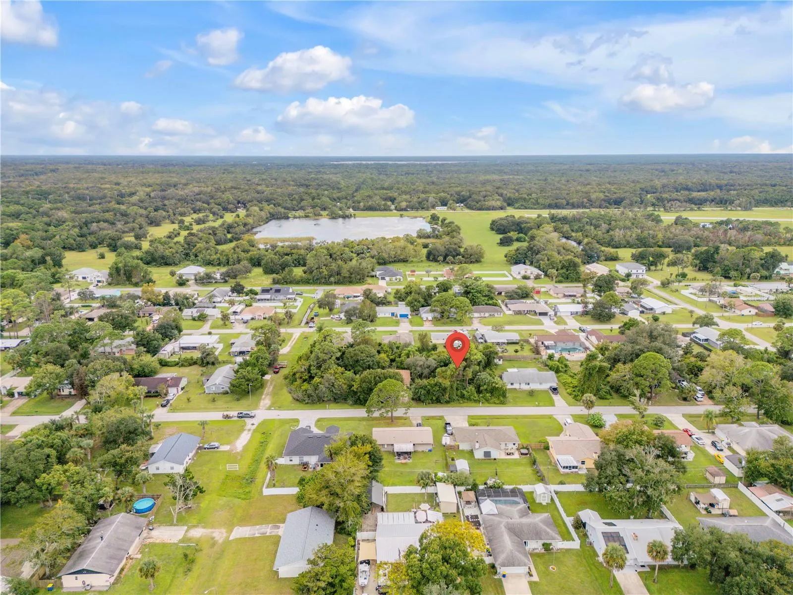 2 lot vacant parcel to the north side of the 4 lot parcel with 3/2 block home for sale, can be purchased together.