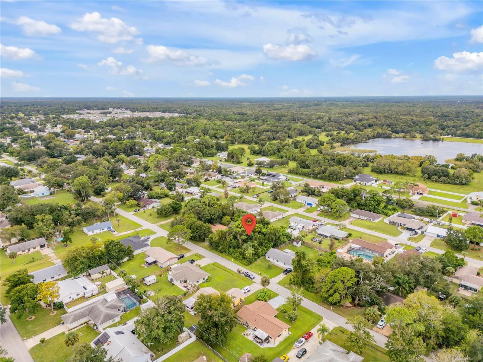 2 lot vacant parcel to the north side of the 4 lot parcel with 3/2 block home for sale, can be purchased together.