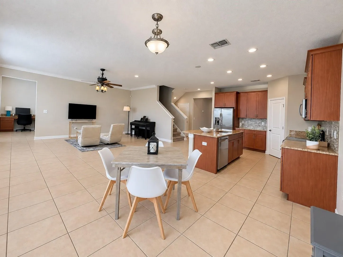 Open-concept kitchen and living area creates an easy flow for gathering and entertaining.