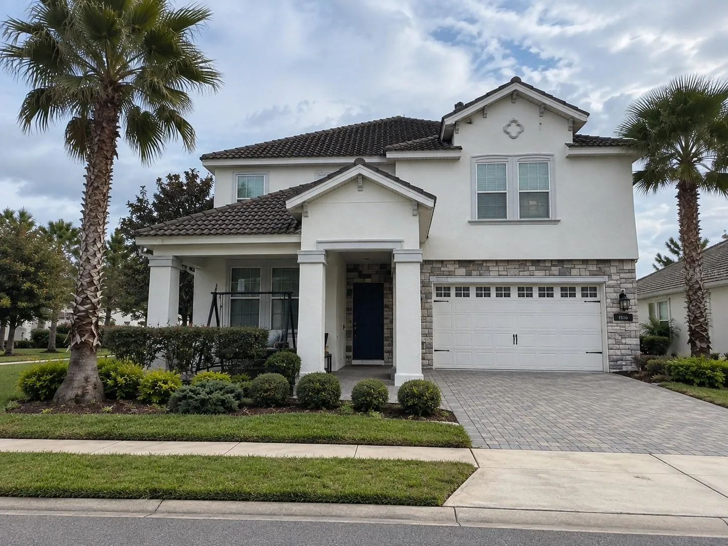 Welcome to 1516 Bunker Drive, a spacious two-story home situated on a desirable corner lot in Champions Gate.