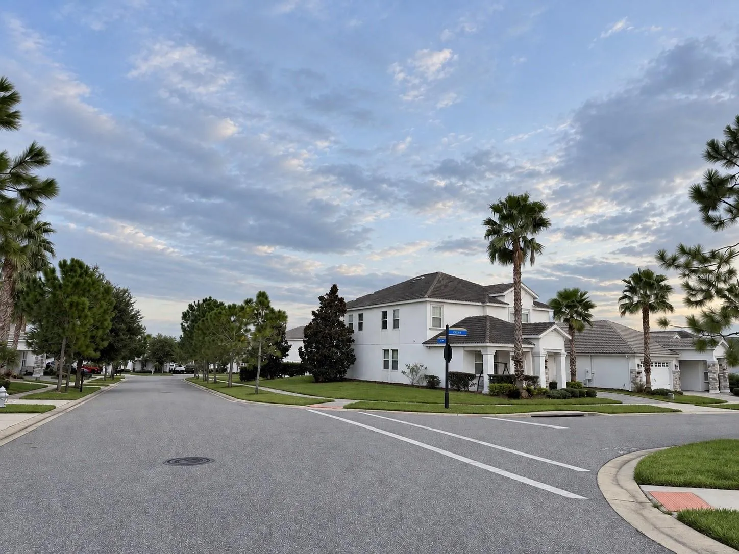 Expansive side yard highlights the additional outdoor space offered by the corner homesite.