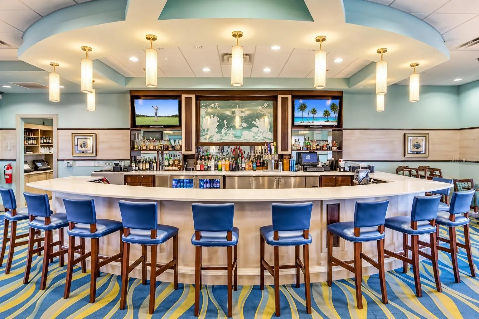 Spacious clubhouse bar offering comfortable seating and a relaxed resort-style atmosphere.