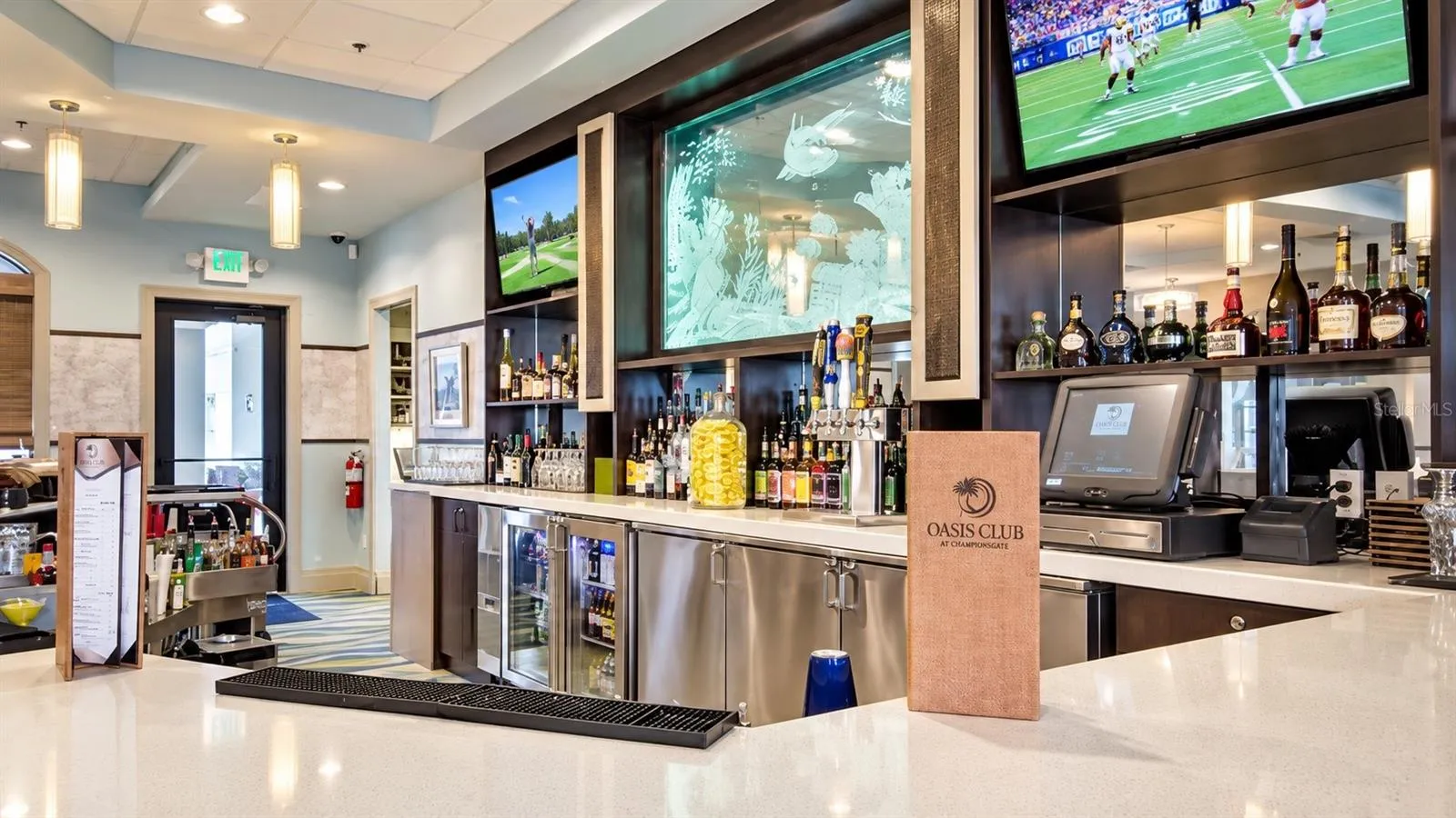 Oasis Club at ChampionsGate features a full-service bar and casual gathering space for residents and guests.