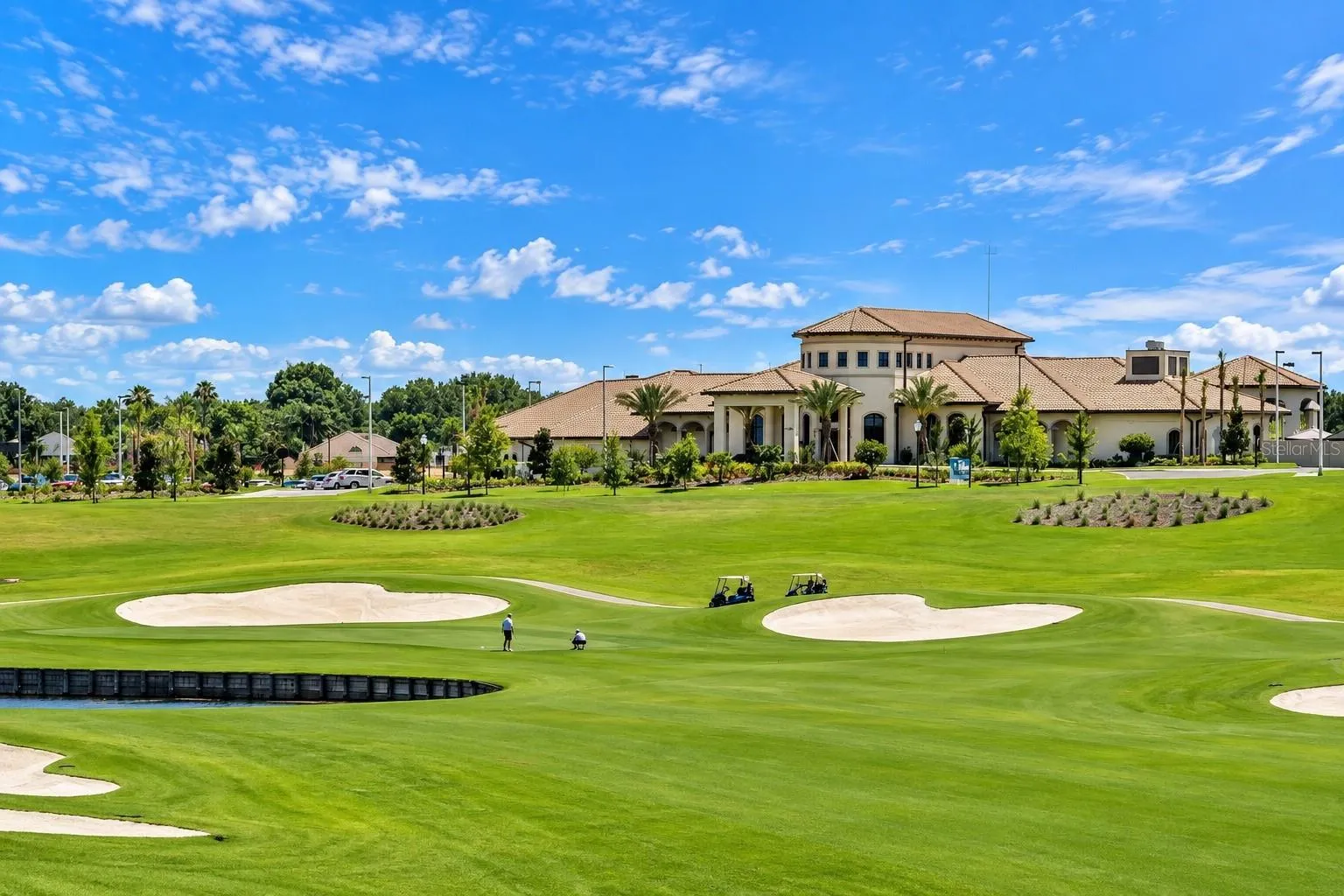 ChampionsGate golf course featuring beautifully maintained fairways, water views and championship-style play.