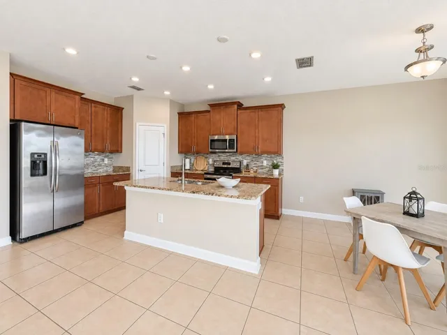 Open dining space connects naturally with the kitchen and main living areas.