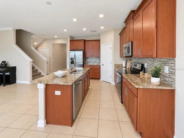 Large kitchen provides excellent prep space and a functional layout for everyday living and entertaining.