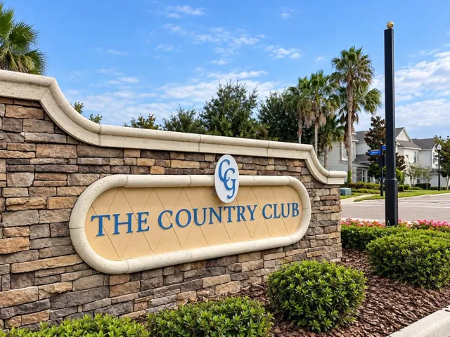 This home is located in The Country Club at Champions Gate, offering a resort-inspired residential lifestyle.