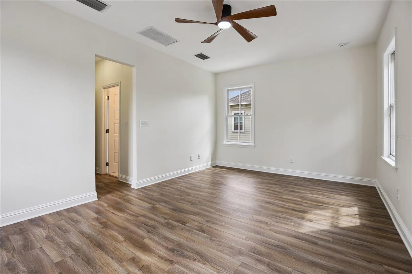 Primary bedroom overlooking the park! (upstairs)