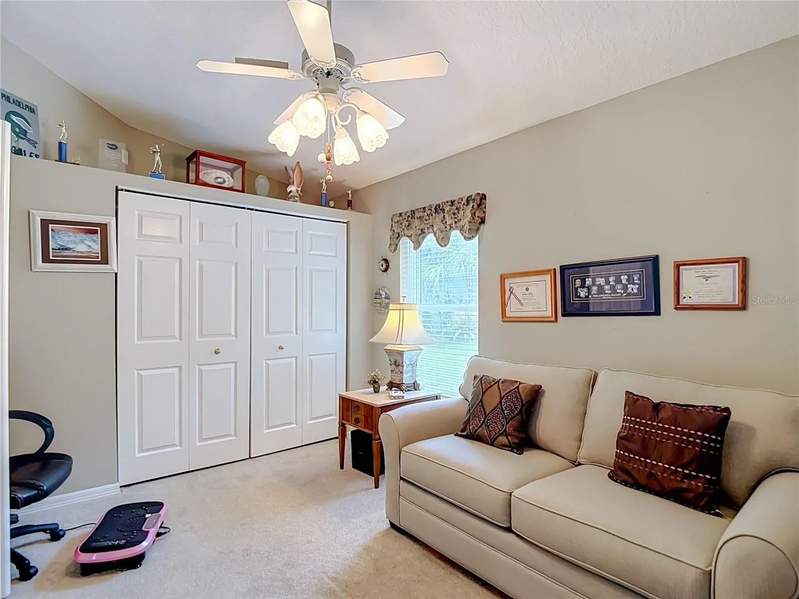 Presently being used as den this room could easily handle bedroom furniture if necessary. Additional  area above the closet for those special momentos.