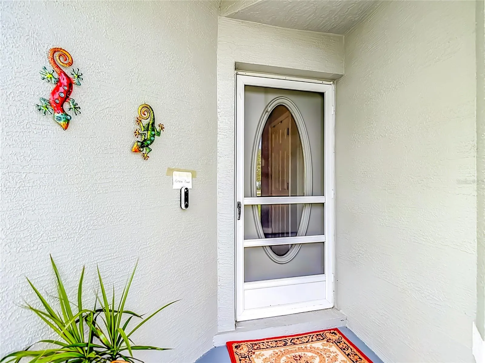 The entry way is screened along with an additional screen  at the front door.