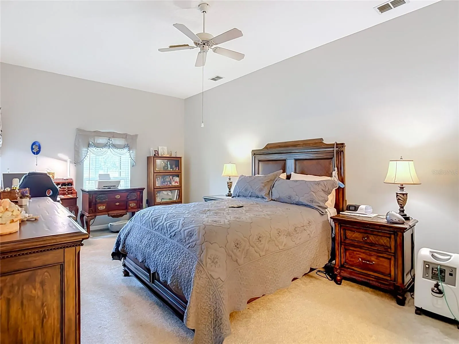 The primary bedroom is a great size (12'x20') with plenty of artifical light from the window and double door out to the lanai / patio.