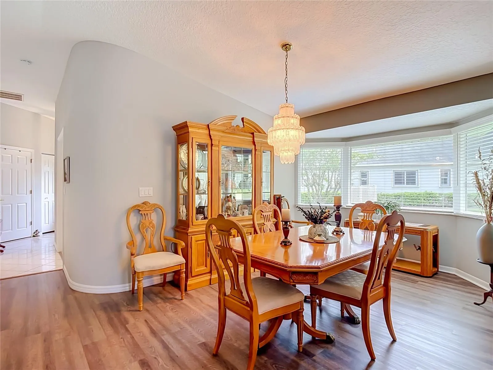 The dining area could easily handle a larger table and chairs for those big family or social get together meals. Notice the rounded wall which was custom item when the villa was built.