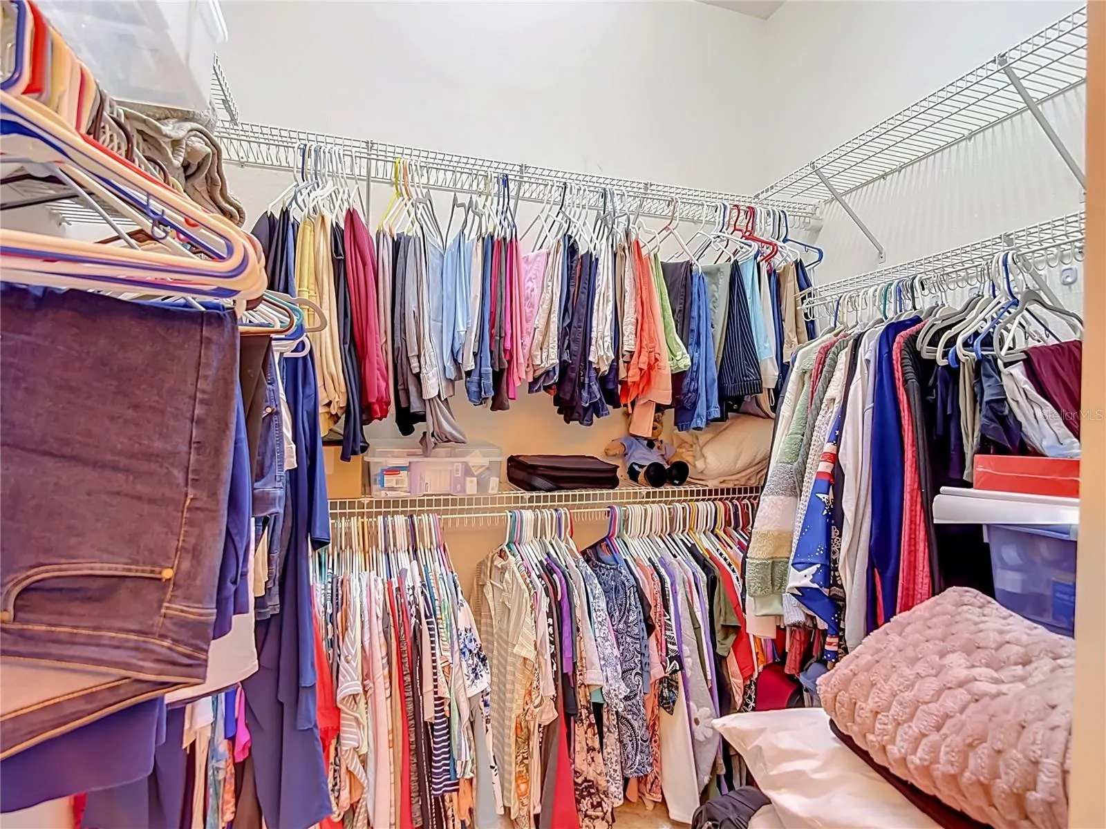 The walk in closet is in the bathroom and can handle quite a bit of clothing
