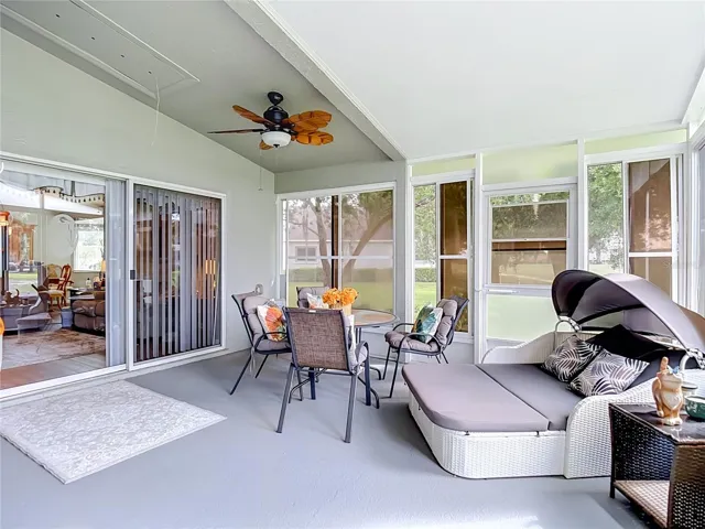 The lanai / patio is huge. Opens from the living room and primary bedroom. Flooring is painted cement.