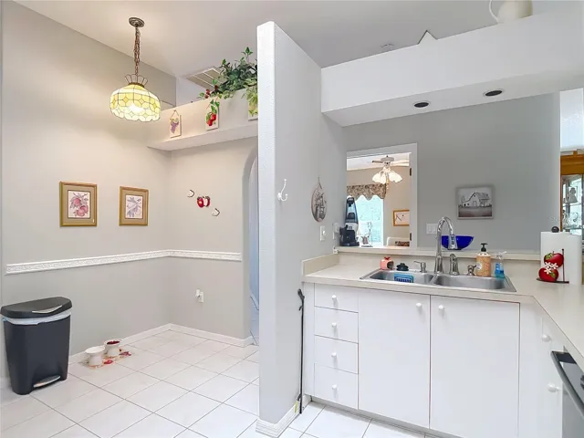 The kitchen also has a sky light for some natural sunlight. To finish the kitchen off a small dinette table would be  beneficial for eating in the kitchen