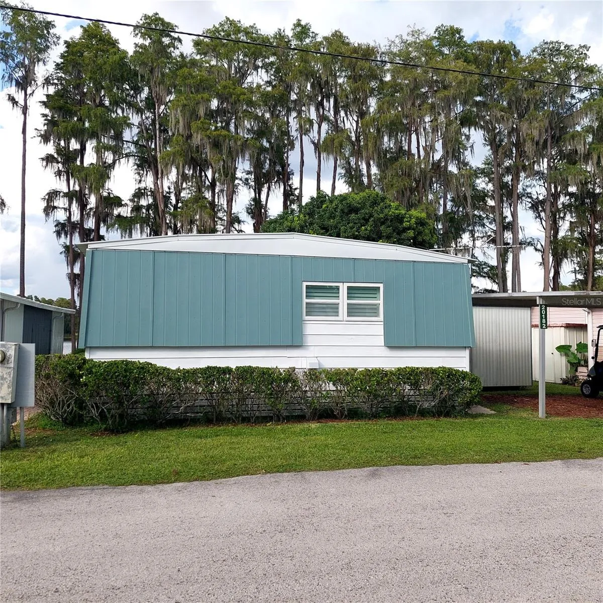 street-facing side is very private, the view is in the rear....nice Homes of Merit built manufactured home called the Dutch Manor.  All exterior siding was replaced with Hardie board.