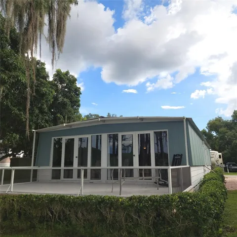 large open deck using Trex decking boards; lovely newer French doors across the rear of the home so you can really enjoy the view