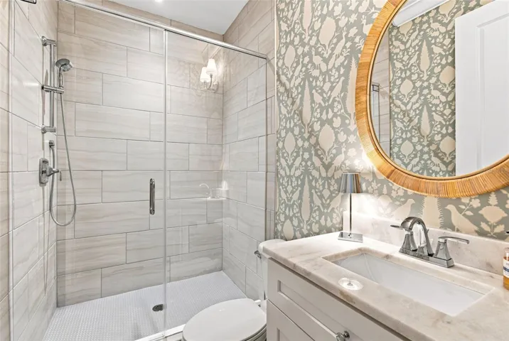 Full downstairs bathroom that services guests and the downstairs bedroom.
