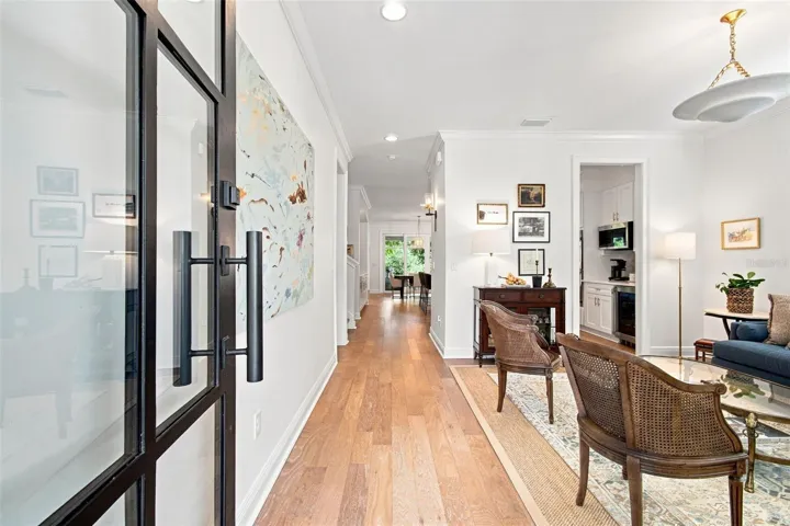 Custom glass front door provides a light filled entry.