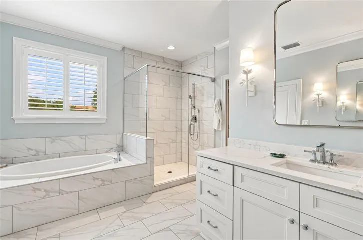 Spacious bath offers separate tub and shower.