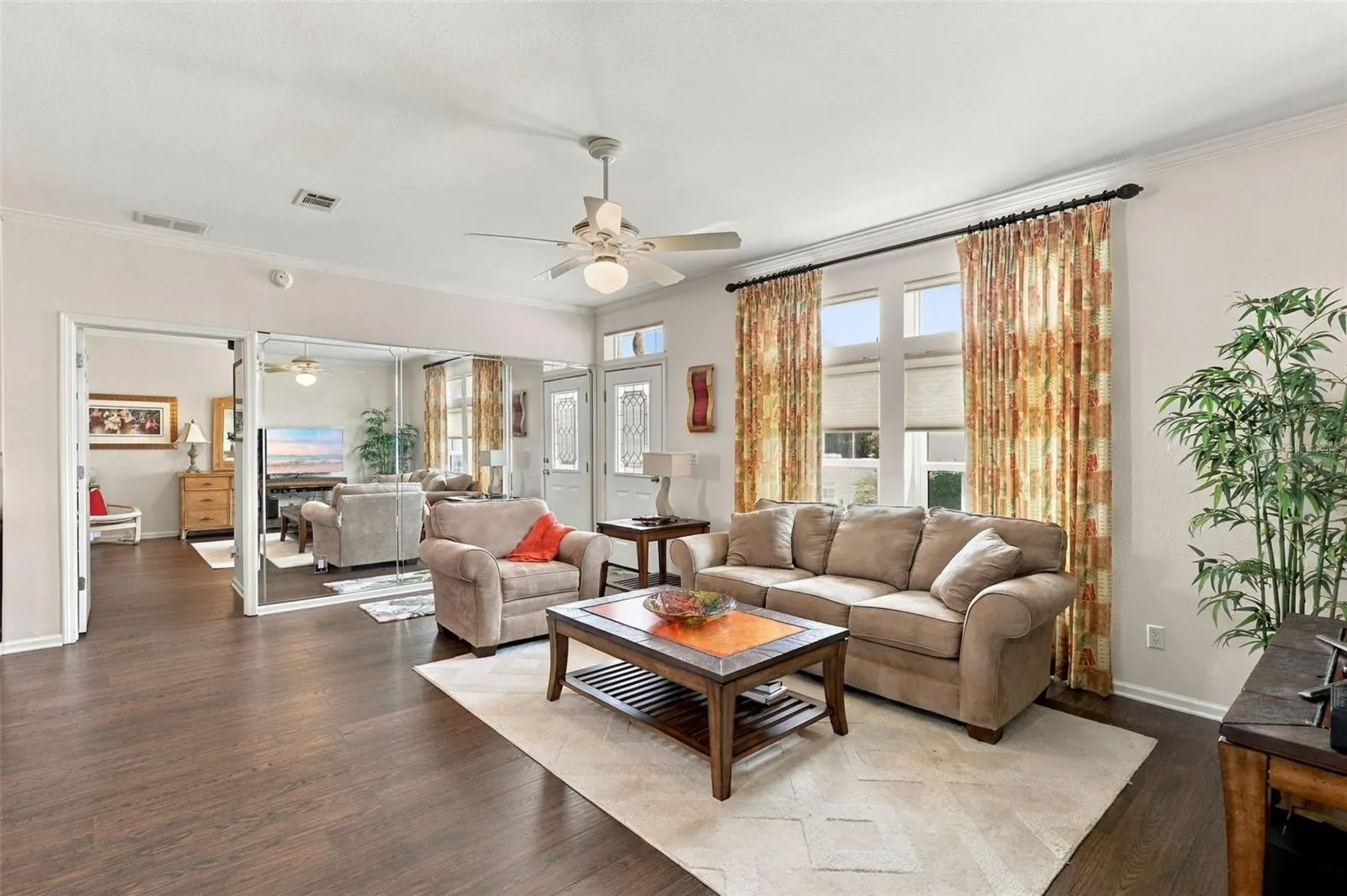 The main living area boasts tall ceilings. Many of the windows in this home are newer.