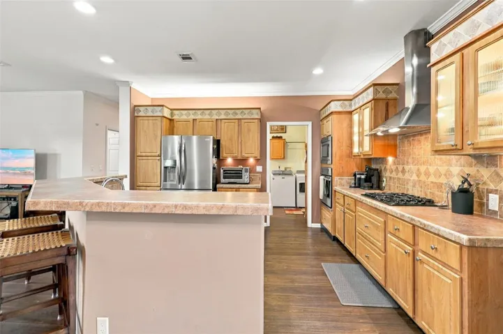 Kitchen towards indoor laundry room.