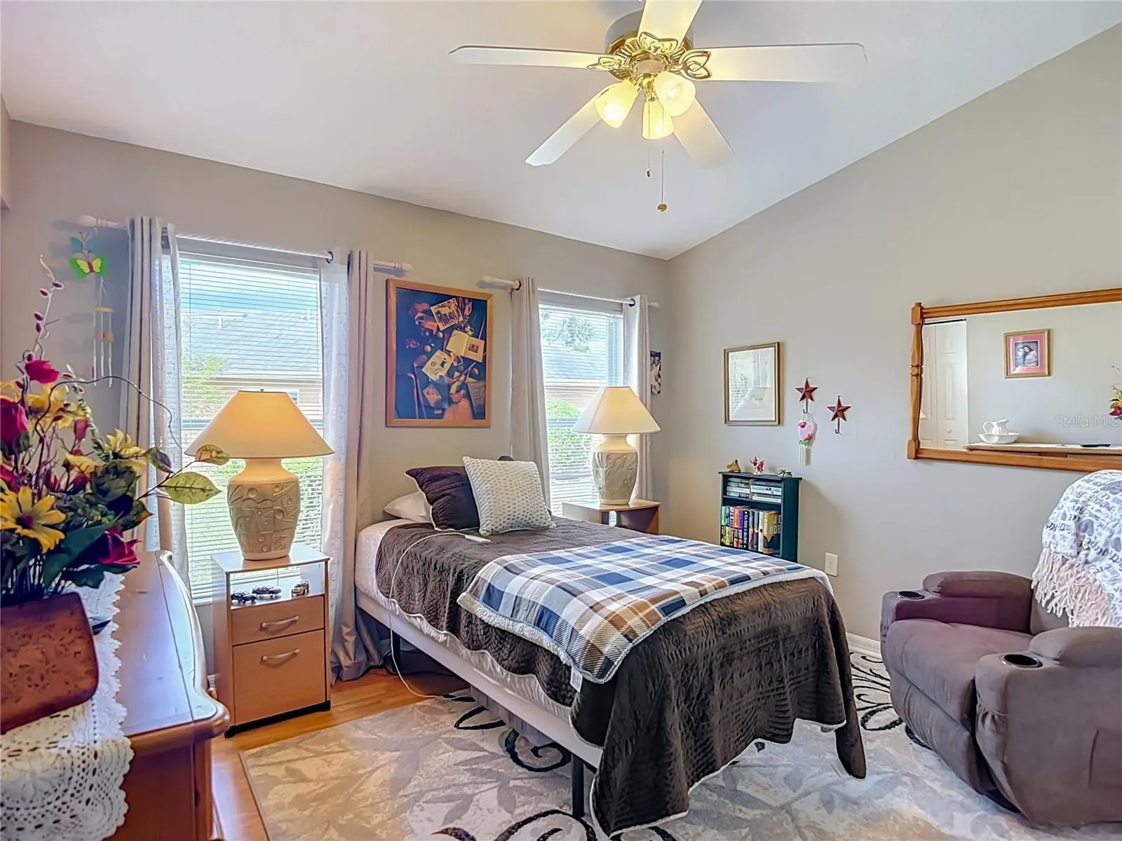 Bedroom 2 presently has a twin bed in place. The 2 windows give you a lot of that natural  lighting again.