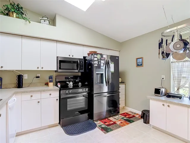 The kitchen has a lot of space for a large table if necessary.