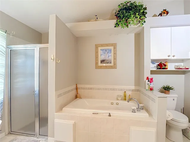 Closed in shower seperate from the Garden Tub. Pick your poison, stimulating shower vs soaking.