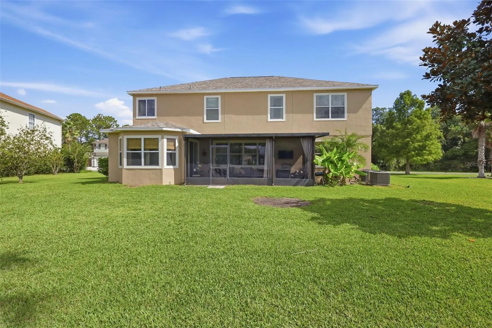 Rear view of this incredible home.