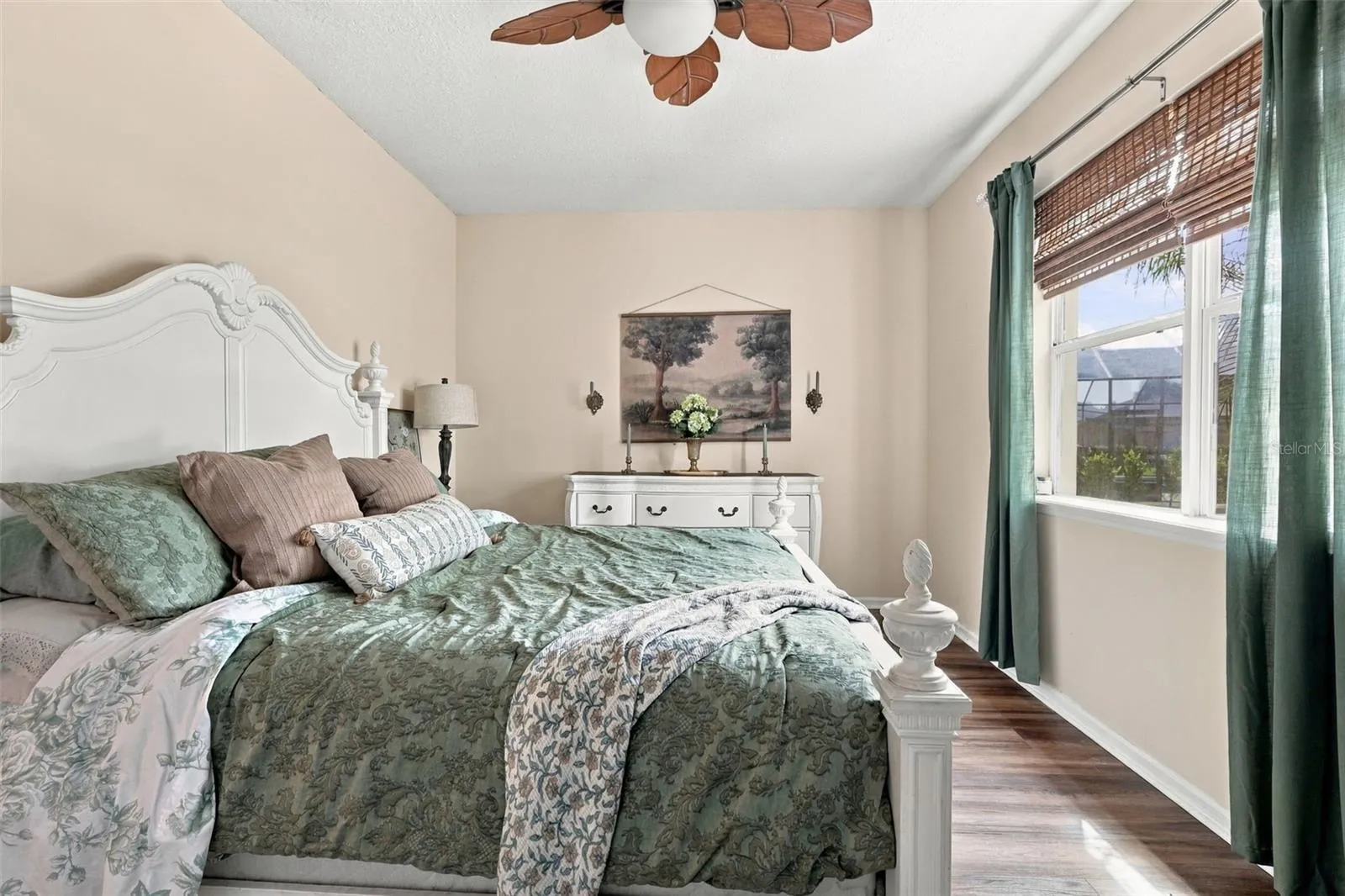 The main floor bedroom overlooks the pond.