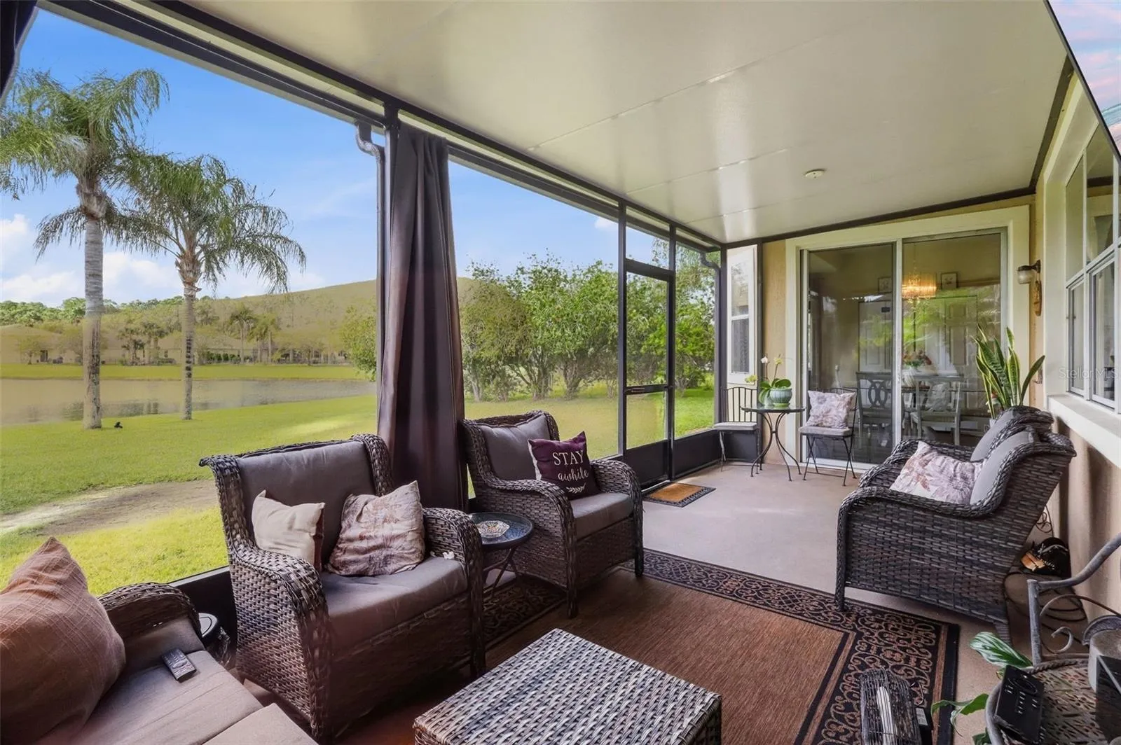 Inside the screened porch you will be able to enjoy the lakefront view without the bugs!
