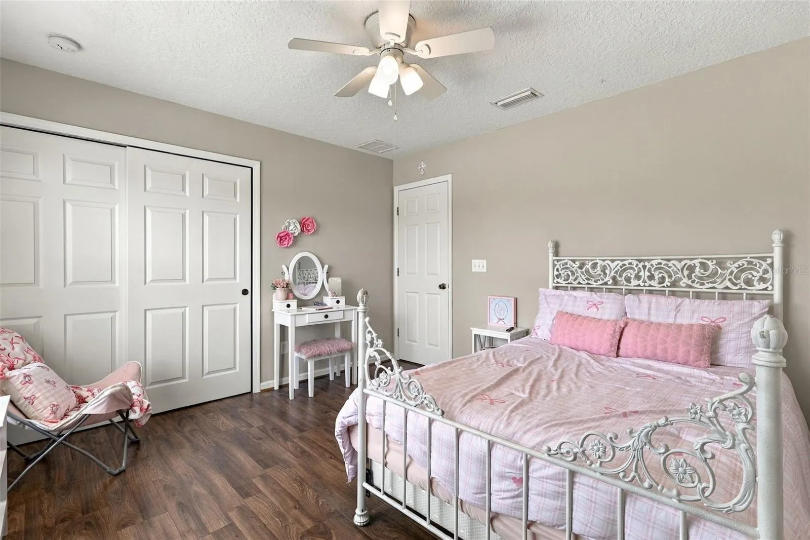 Down the hall you find the 3rd bedroom with built in closet and ceiling fan