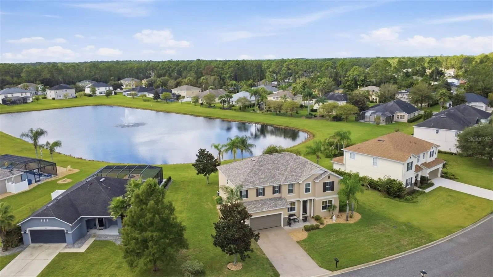 Aerial view of property. NO rear neighbors enjoy the view of the pond.