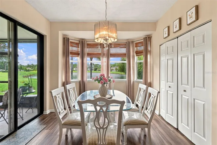 Enjoy the views of the pond from this dining area. Huge pantry at right.