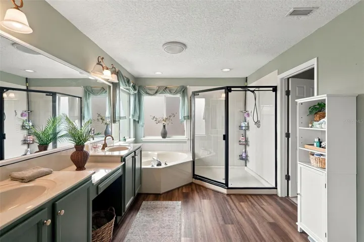 Enjoy the dual vanity, spa tub, walk-in shower and walk-in closet all in one space.