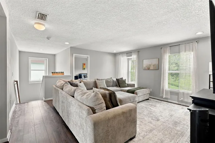 The second living area is great for extra guest or simply relaxing upstairs without having go downstairs!