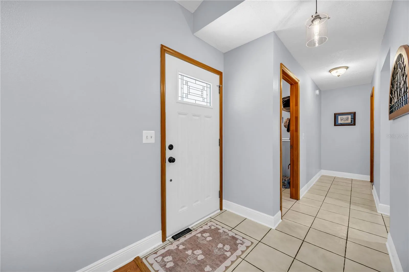 Hall to Laudry Room, Kitchen and Primary Suite