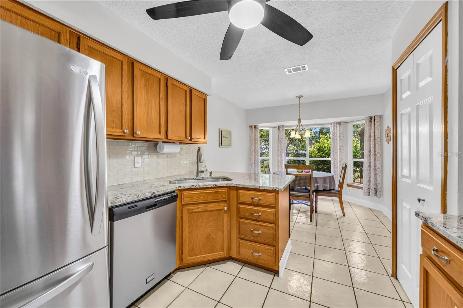 Stainless steel appliances, Granite counter tops and wood cabinets
