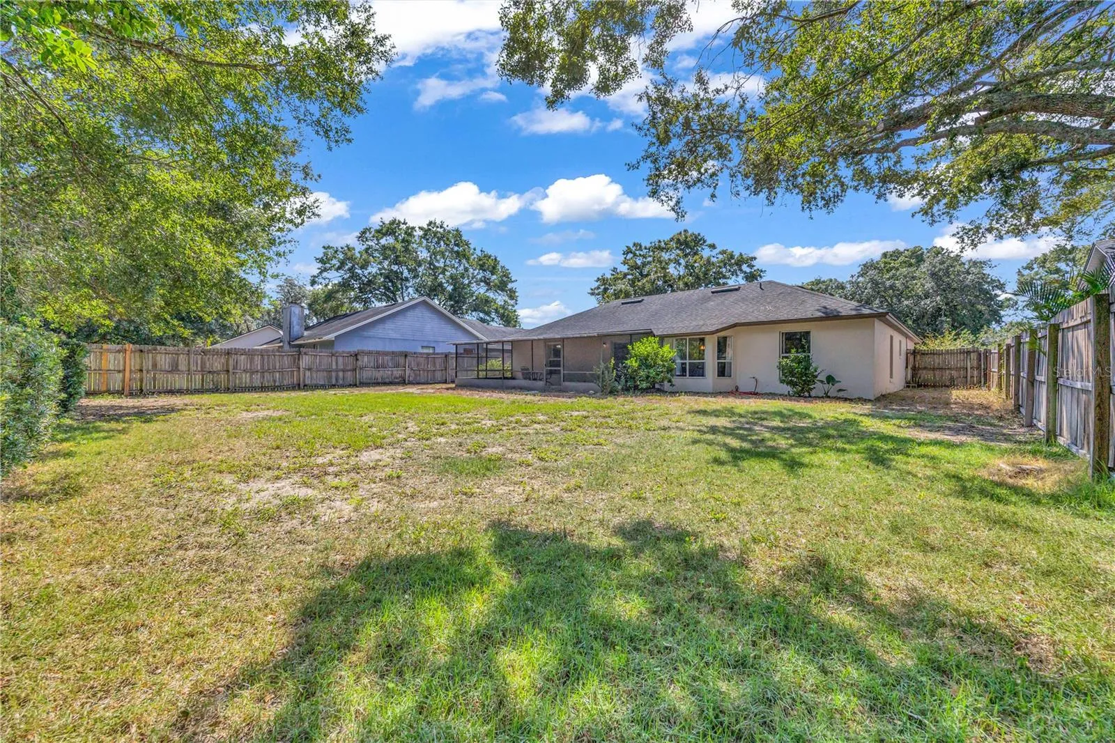 large, fenced backyard