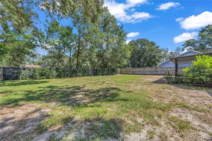 large, fenced backyard