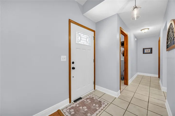 Hall to Laudry Room, Kitchen and Primary Suite