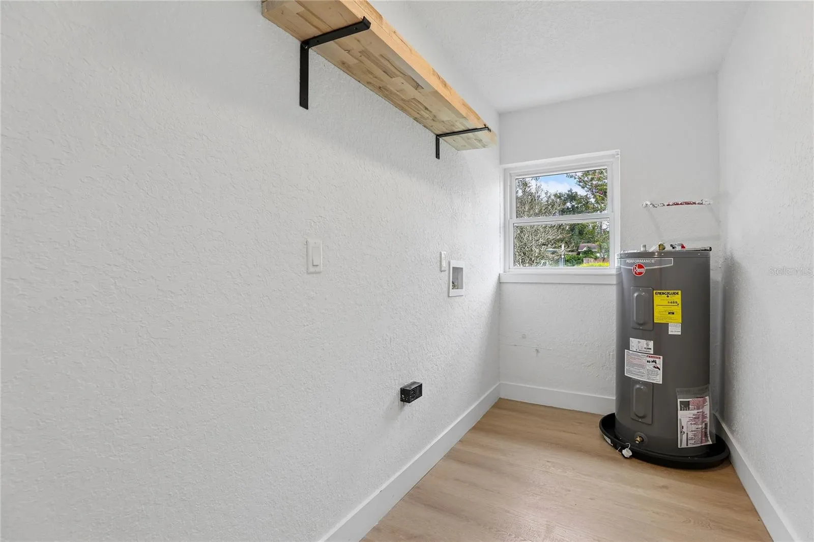 Dedicated indoor laundry + 2026 WATER HEATER — another major update already done