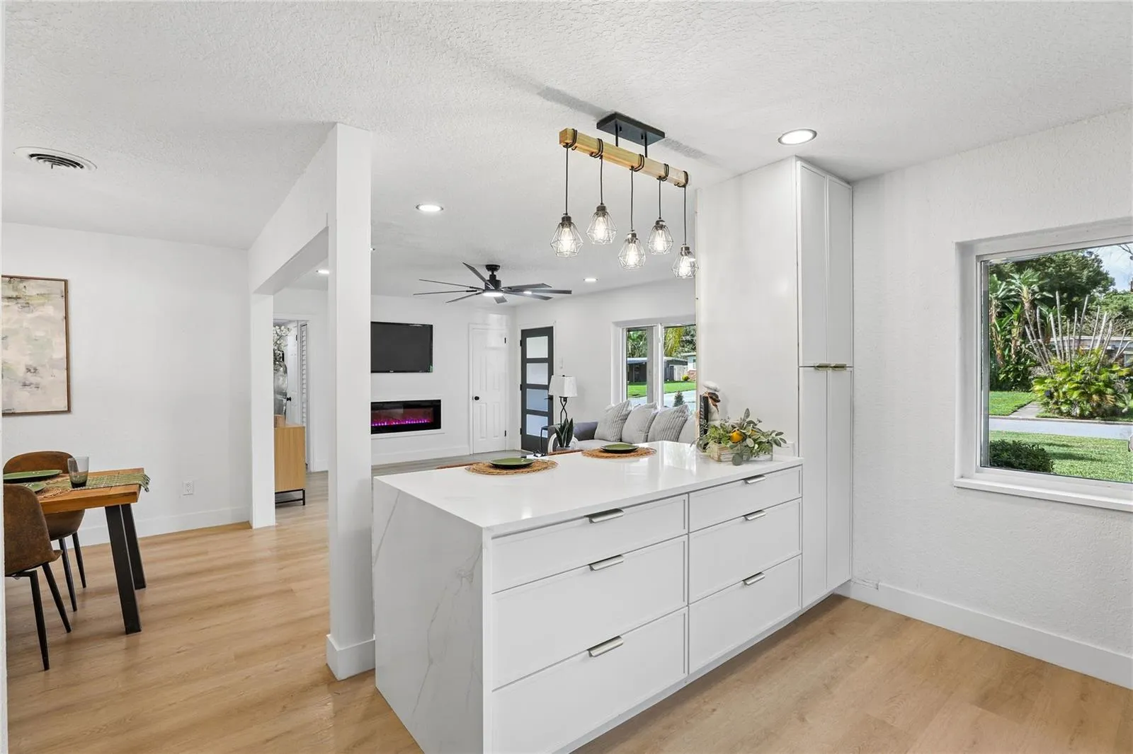 The heart of the home — redesigned kitchen with waterfall-edge island