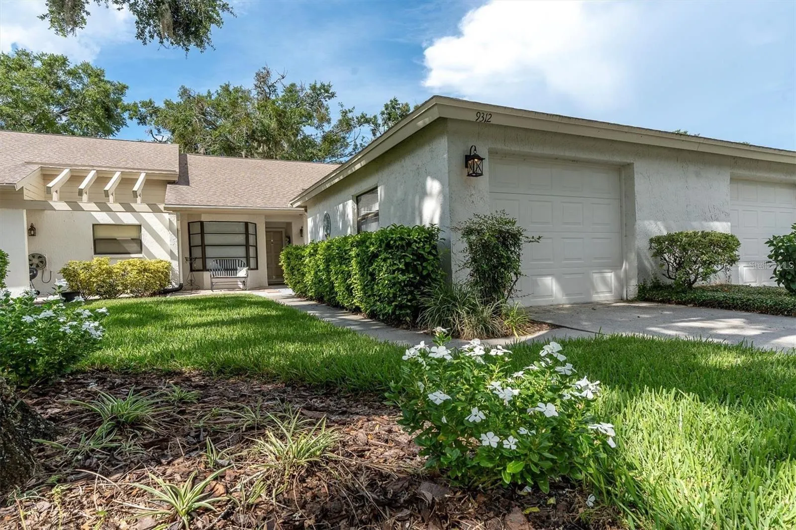 Detached oversized garage with driveway