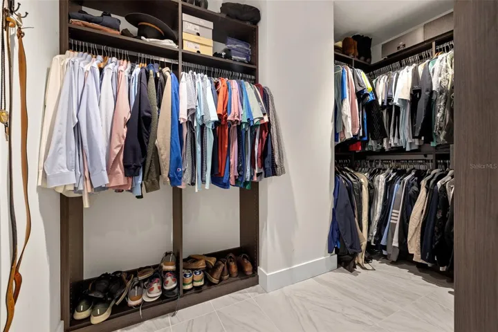 Primary Walk in Custom Closet