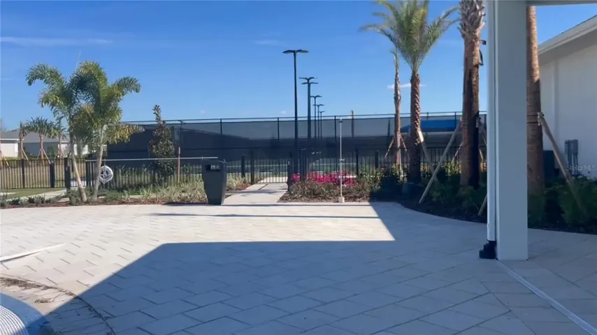 Back of Clubhouse to Courts