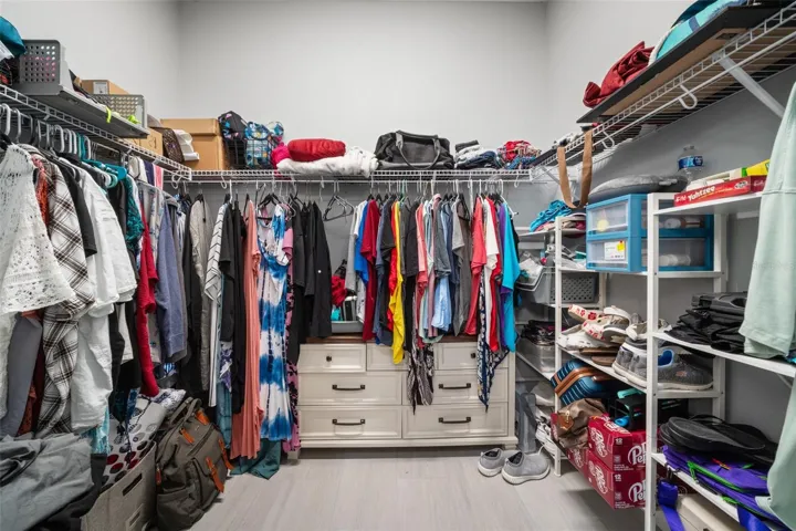 Primary Suite walk in closet