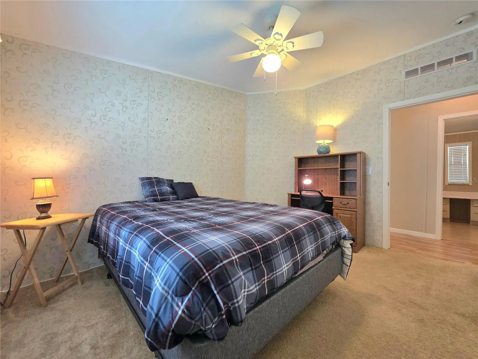 Guest bedroom with walk-in closet.